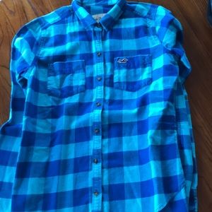 Super cute button up shirt!